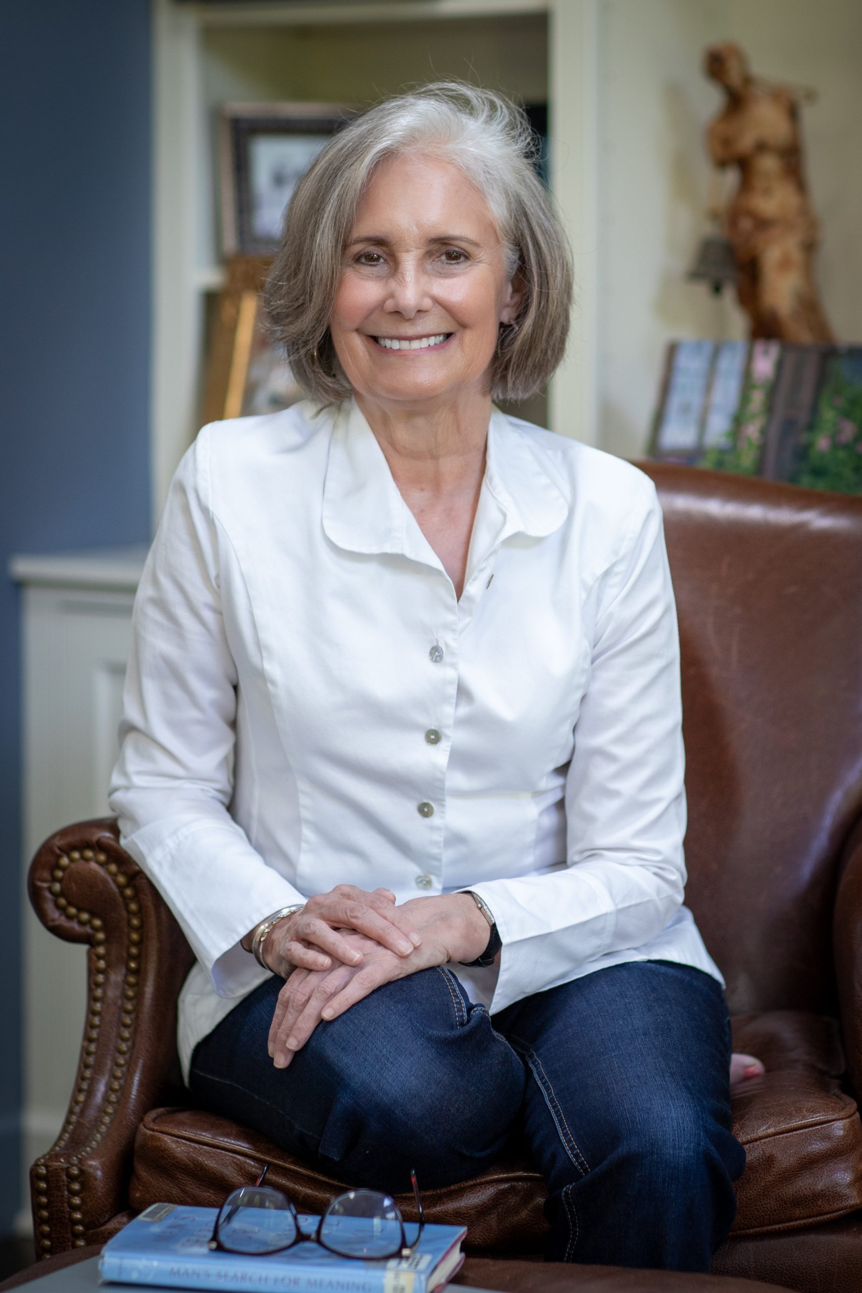 Mary Pat Cleary, Board Certified Life Coach, seated in her Rochester NY office